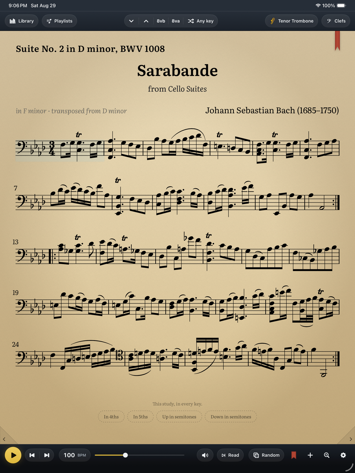 Practice Farm on iPad: Bach's Sarabande from the second cello suite, transposed to F minor and engraved in bass clef for tenor trombone, with the transport bar below